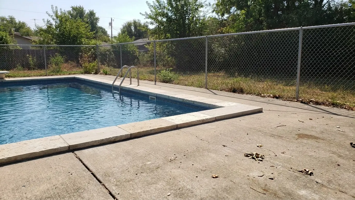 After: Pool edge finished with stone coping | Music City Brick Mason After: a swimming pool with cut limestone coping along the pool edge